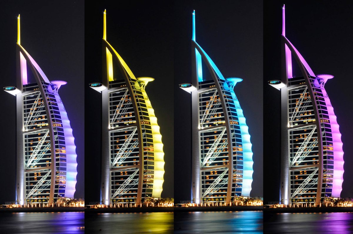 Burj Al Arab facade lit with combination colour scheme at night